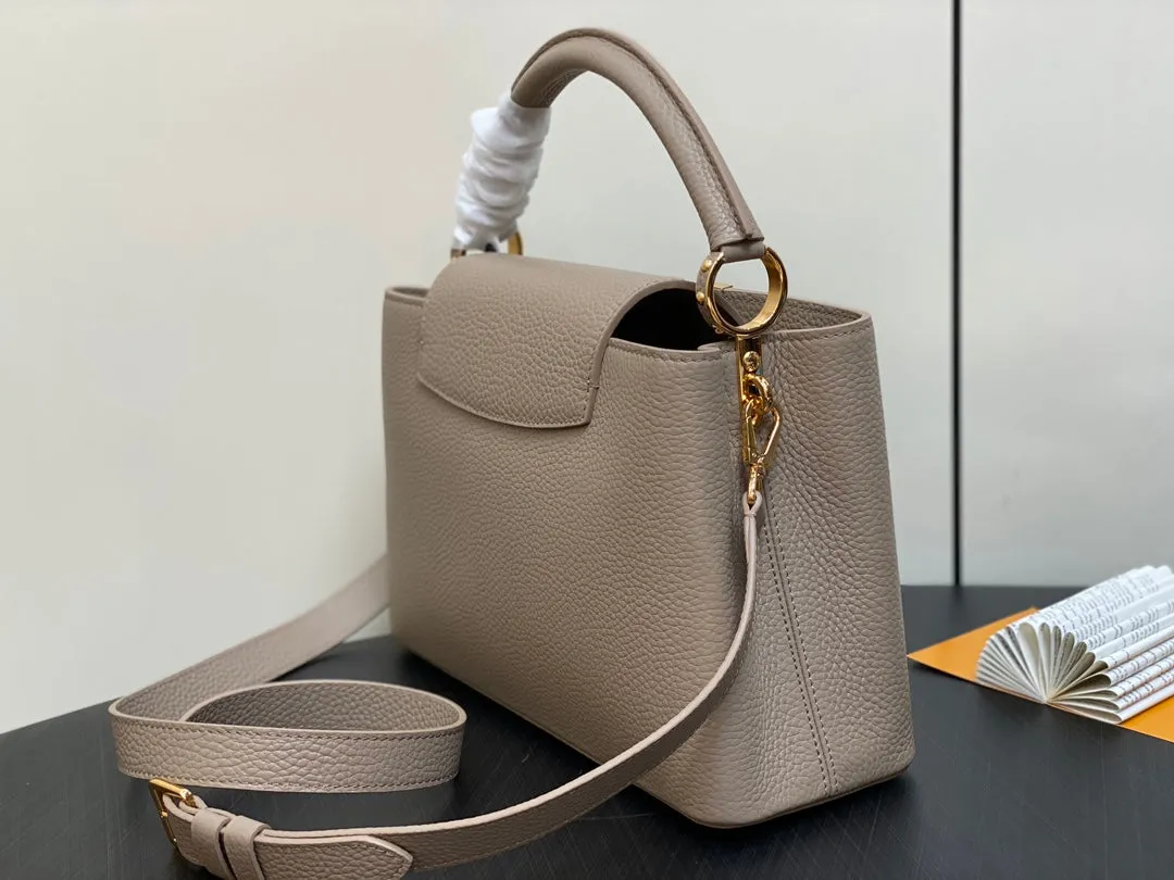 Louis Vuitton CAPUCINES MM 31 IN KHAKI BROWN TAURILLON