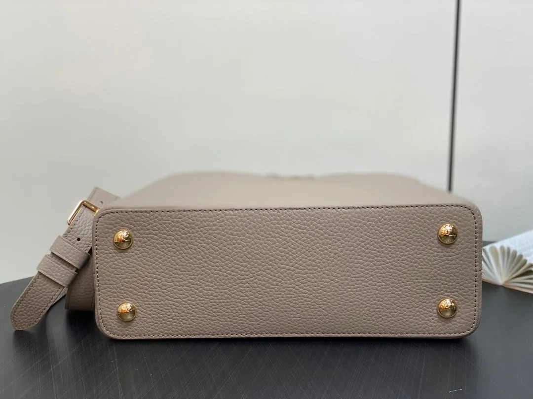 Louis Vuitton CAPUCINES MM 31 IN KHAKI BROWN TAURILLON