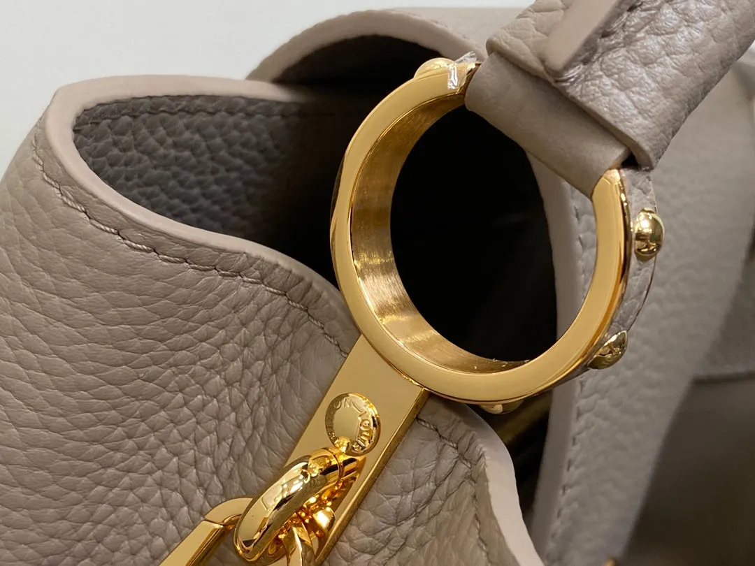 Louis Vuitton CAPUCINES MM 31 IN KHAKI BROWN TAURILLON