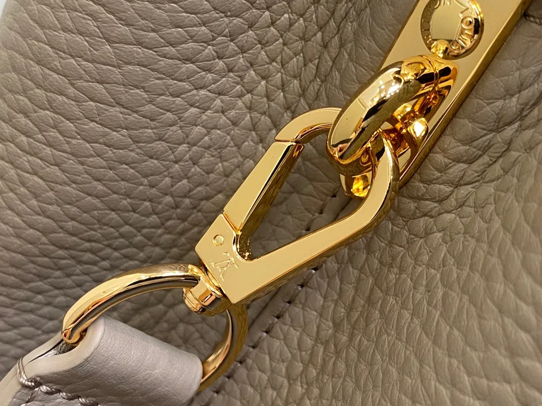 Louis Vuitton CAPUCINES MM 31 IN KHAKI BROWN TAURILLON
