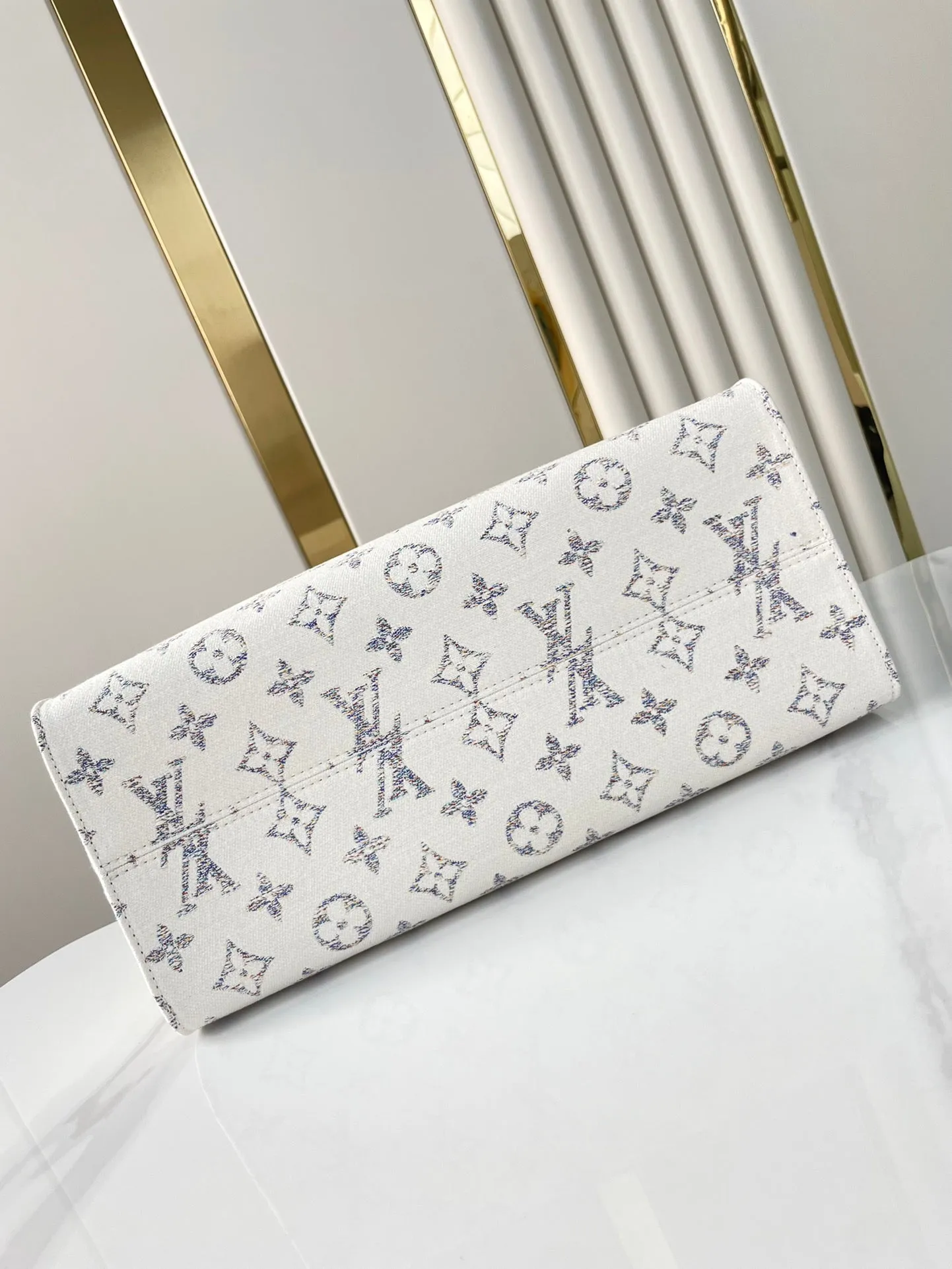 Louis Vuitton ONTHEGO MM 35 IN WHITE MONOGRAM JACQUARD FABRIC